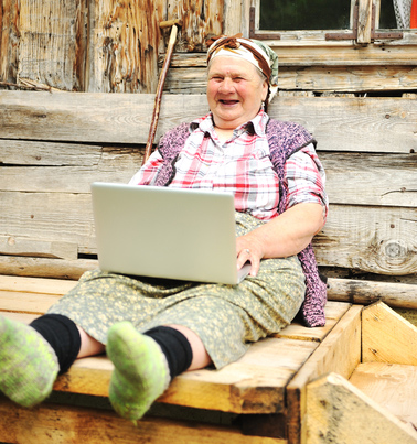 Old-peasant-woman-with-laptop.